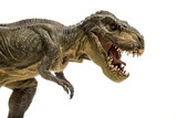 An extreme closeup view of an ominous T-Rex dinosaur figurine isolated against a clean white background. Monstrous animal with sharp teeth.