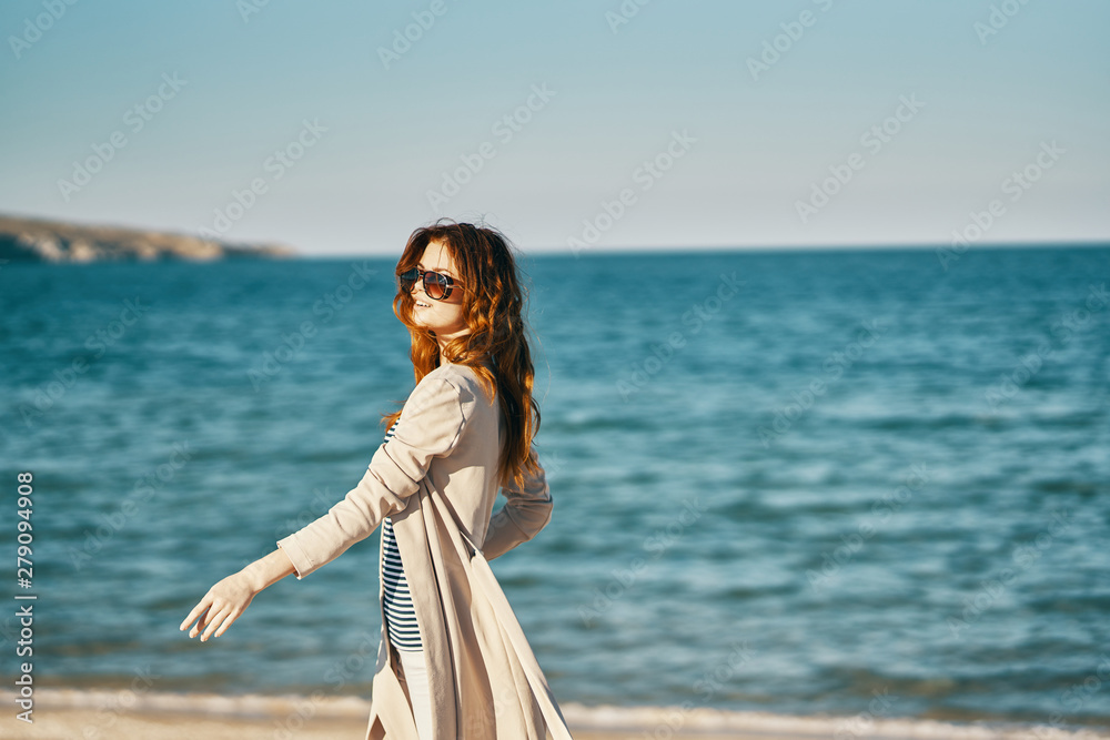 portrait of a beautiful woman with perfect skin looking at camera