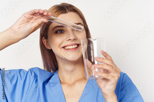 young woman with a glass of water