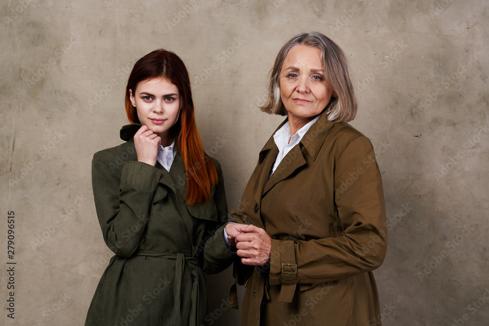 two business women in black coat