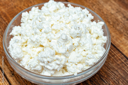 farm cottage cheese close up on wooden background protein healthy diet eco product