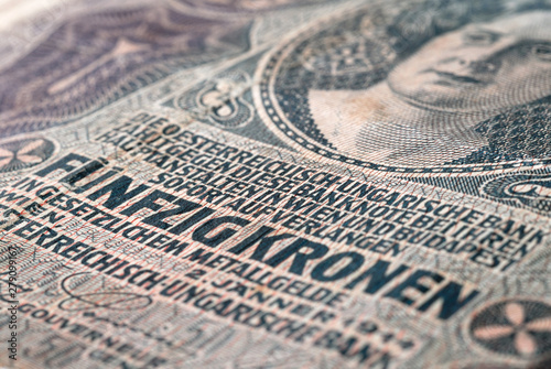 Fragment of fifty crowns banknote of the Austrian Empire 1914 selective focus. Shallow depth of field photo