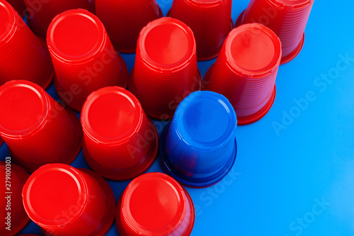 Beer pong, college party game. Plastic red and blue color cups