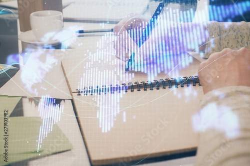 Wallpaper Mural International business hologram over woman's hands taking notes background. Concept of success. Double exposure Torontodigital.ca