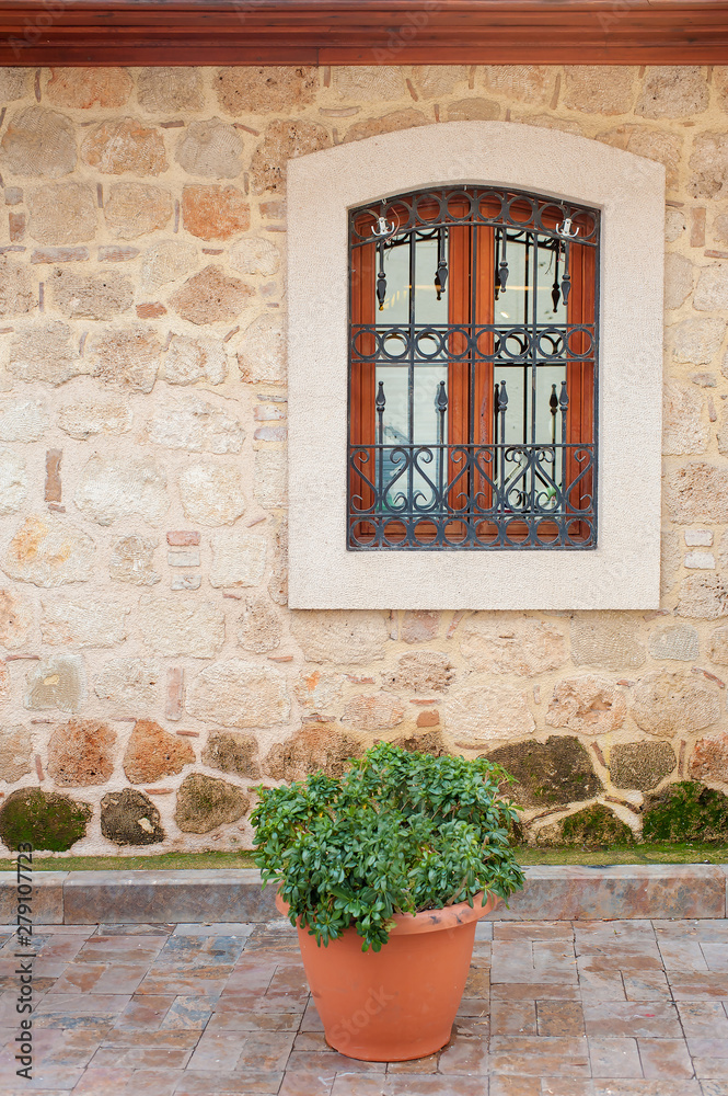 wall with wooden vintage window.