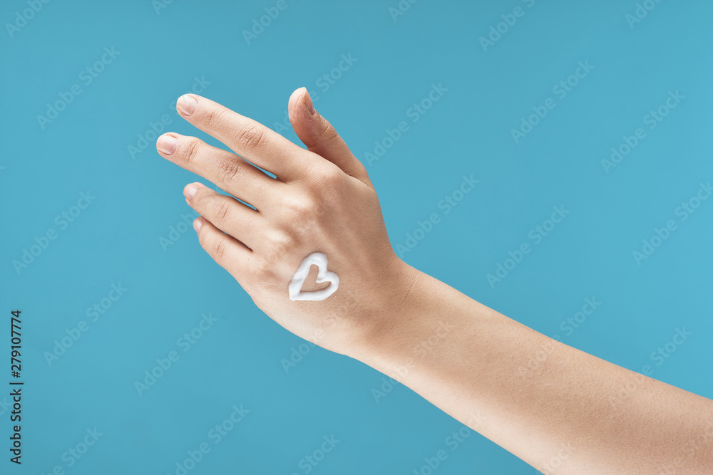 hand on blue background