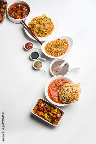 Assorted Indo chinese dishes in group includes Schezwan/Szechuan hakka noodles, veg fried rice, veg manchurian, american chop suey, chilli paneer, crispy vegetable and vegetable soup