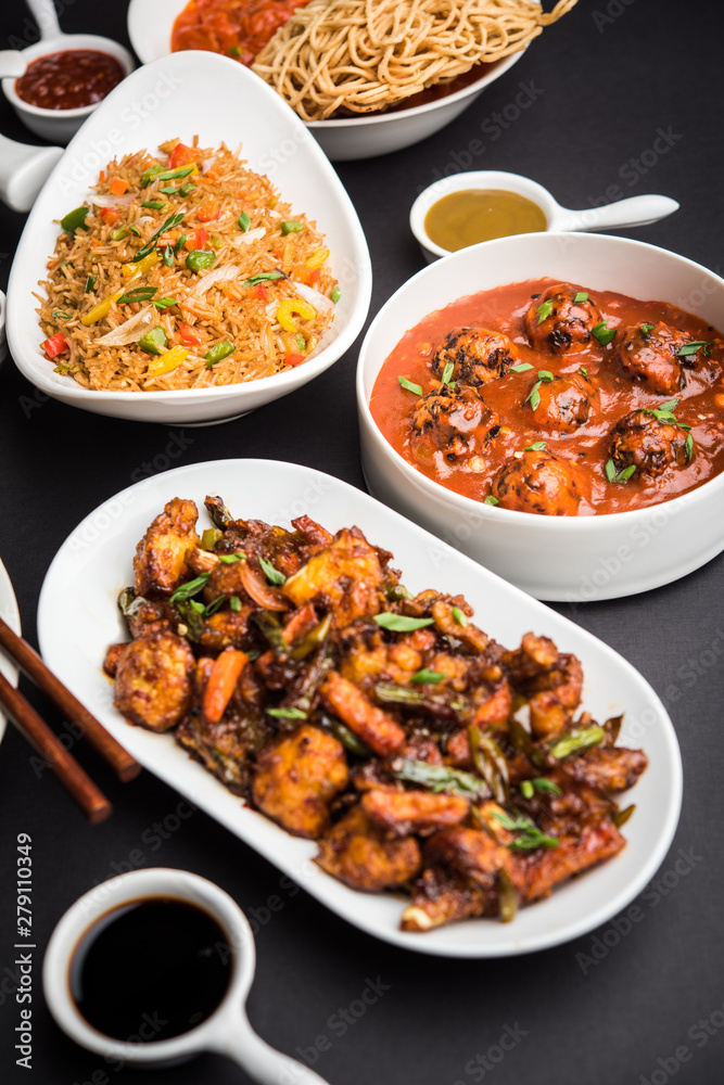 Assorted Indo chinese dishes in group includes Schezwan/Szechuan hakka noodles, veg fried rice, veg manchurian, american chop suey, chilli paneer, crispy vegetable and vegetable soup Assorted Indo chinese dishes in group includes Schezwan/Szechuan hakka noodles, veg fried rice, veg manchurian, american chop suey, chilli paneer, crispy vegetable and vegetable soup