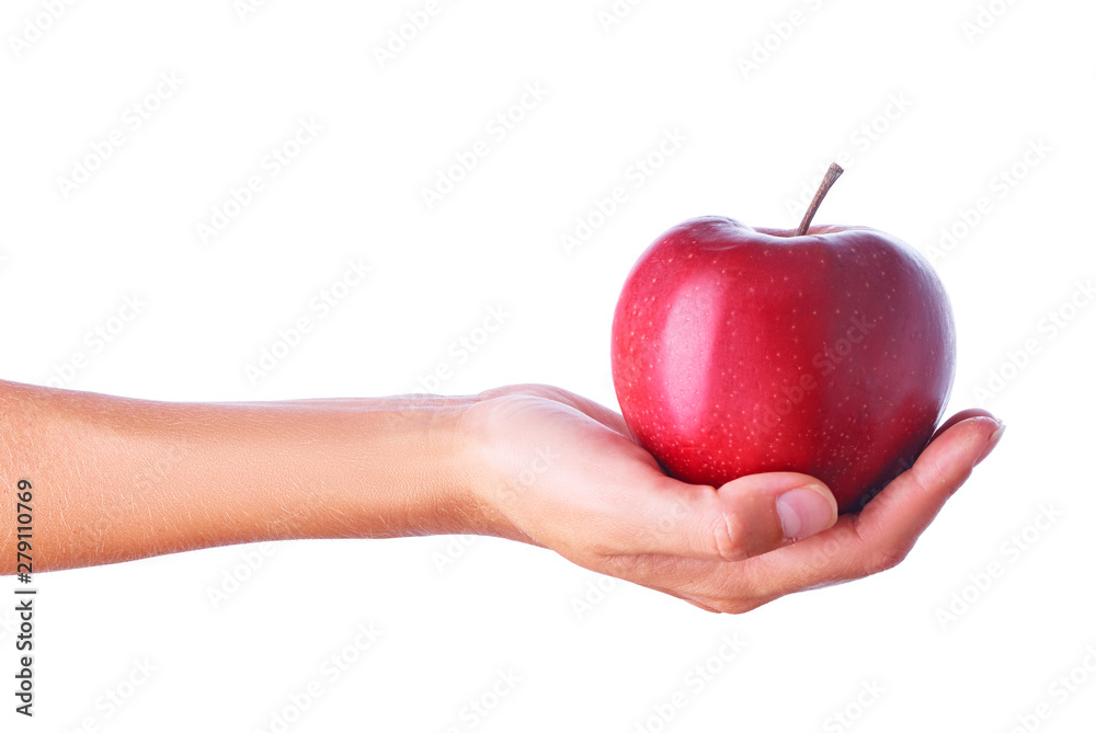 Close up studio shot of female hand holding fresh apple. Isolated on white background. Close up studio shot of female hand holding fresh apple. Isolated on white background.
