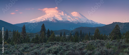 View of Mount Shasta Volcano with glaciers, in California, USA. Panorama from north. Mount Shasta is a potentially active volcano at the southern end of the Cascade Range in Siskiyou County photo