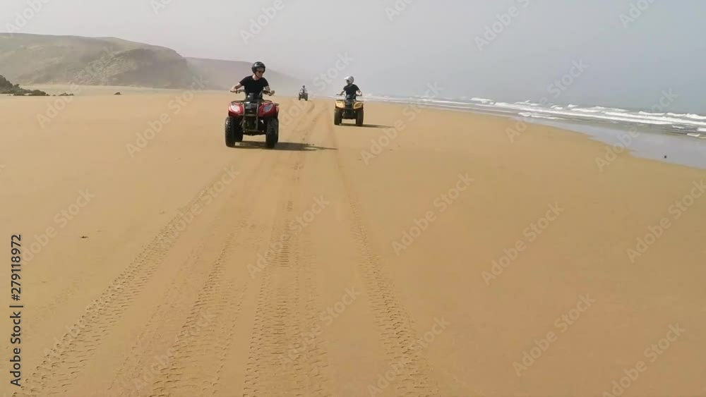 Shot One. Tracking Action Shot of Quad Bikes on Deserted Beach in Morocco. Shot One. Tracking Action Shot of Quad Bikes on Deserted Beach in Morocco.