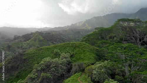 Version Four, Man Stationary. Aerial Flyover of Man on Mountain Ridge in Hawaii, with Beautiful Panoramic View. photo