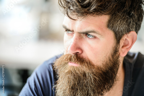 Bearded man feel loneliness. brutal male needs barber. waiting and tinking. thoughtful man outdoor. Facial skin care. Mature hipster with beard hair. Confident and handsome Brutal man photo