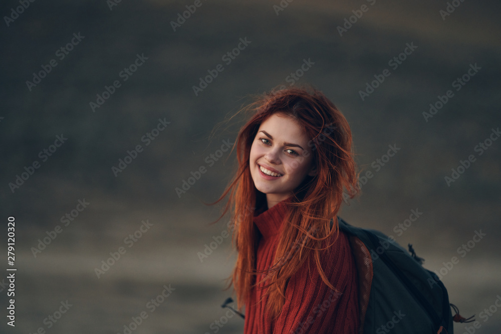 portrait of young woman at sunset