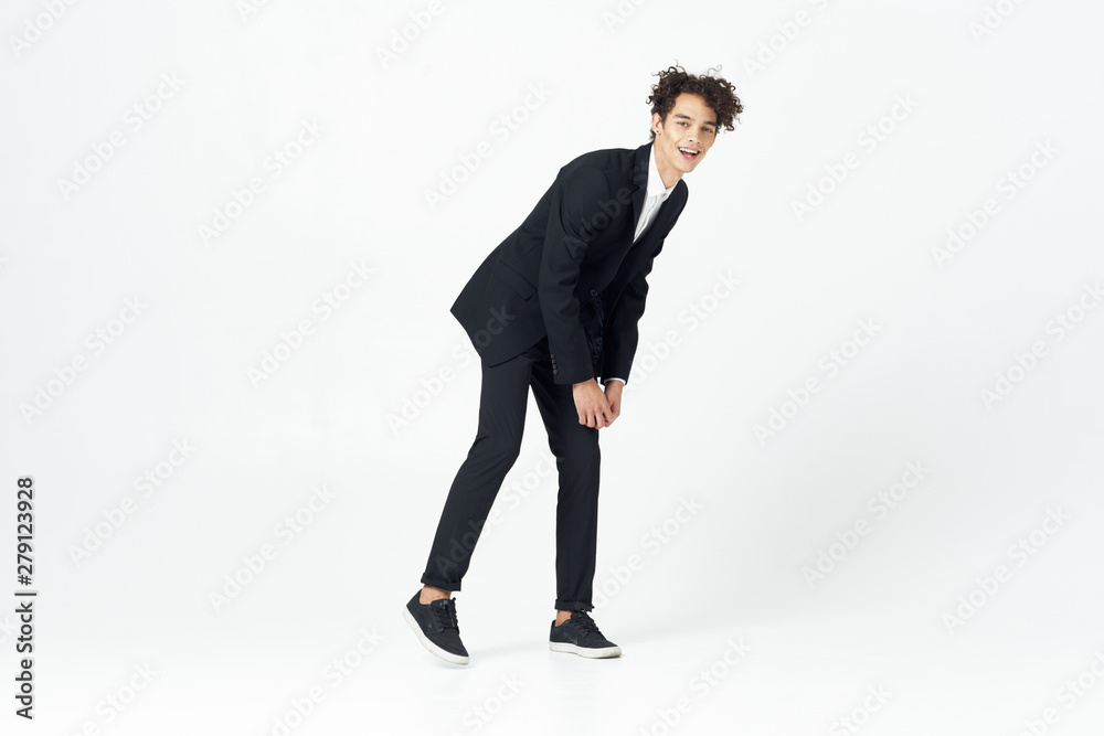 portrait of businessman standing with his hands in pockets portrait of businessman standing with his hands in pockets