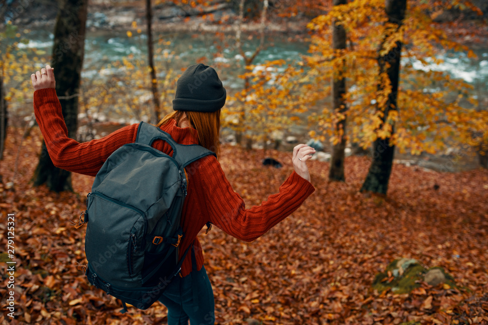 Naklejka premium little boy in autumn forest