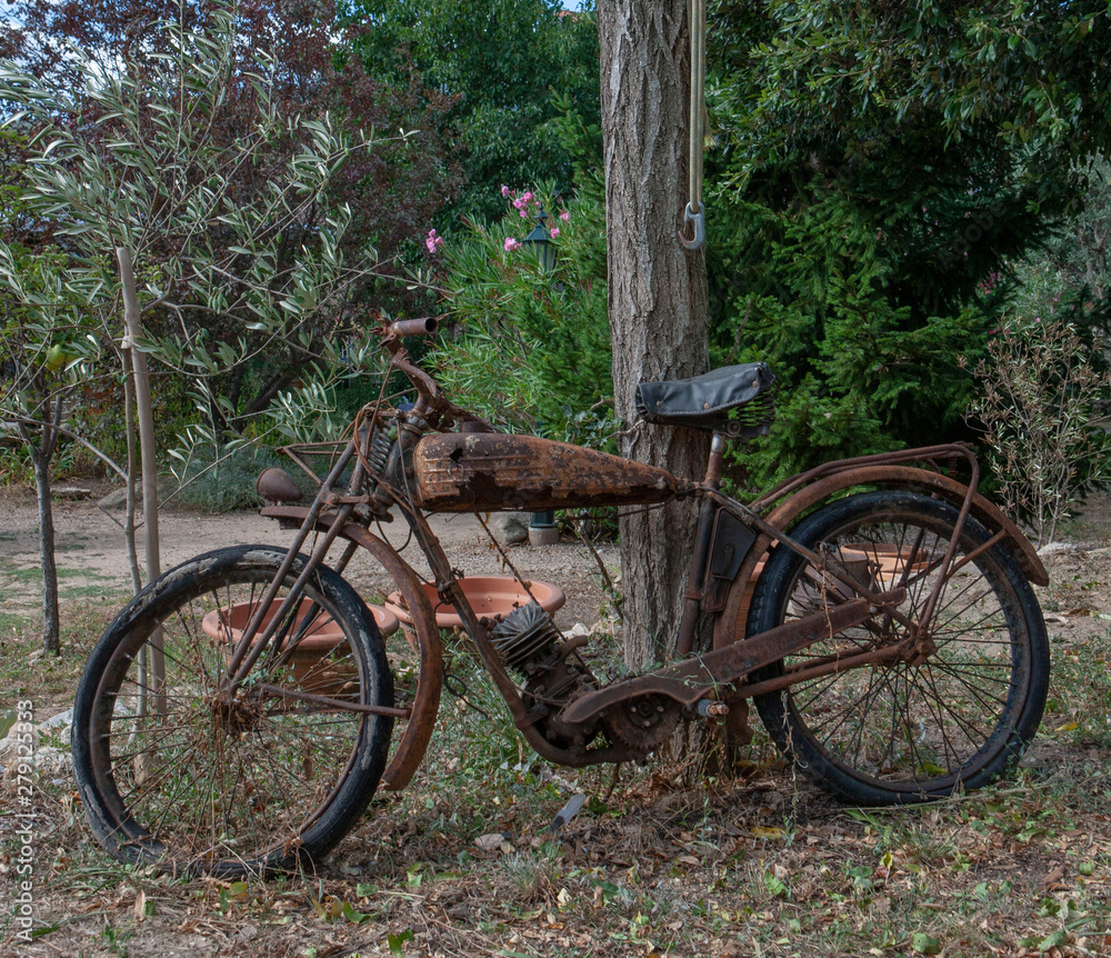 Mons la Trivalle Languedoc France. Old rusty motocycle. Oldtimer