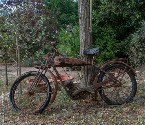 Mons la Trivalle Languedoc France. Old rusty motocycle. Oldtimer