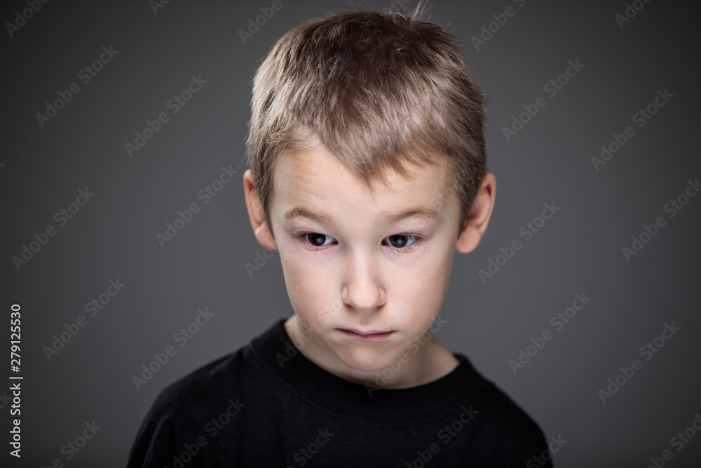 Grief-stricken little boy - feeling intense sorrow, remorse, sadnesss - studio portrait - vivid emotions series Grief-stricken little boy - feeling intense sorrow, remorse, sadnesss - studio portrait - vivid emotions series