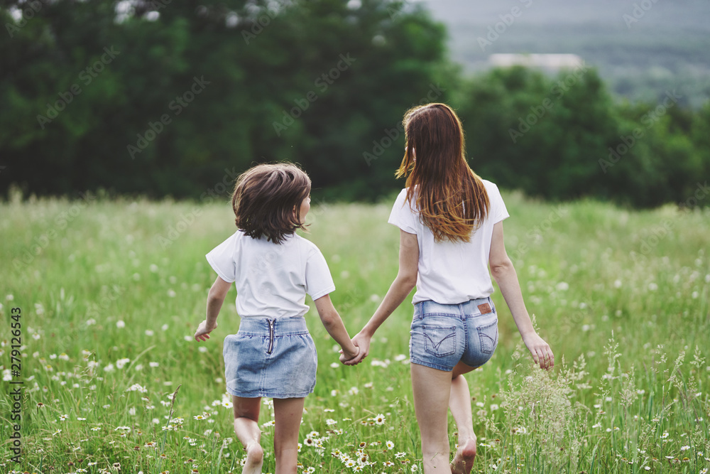 Fototapeta premium mother and daughter in the park