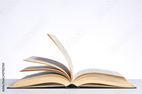 open book isolated on white background with copy space for your text © Andrea