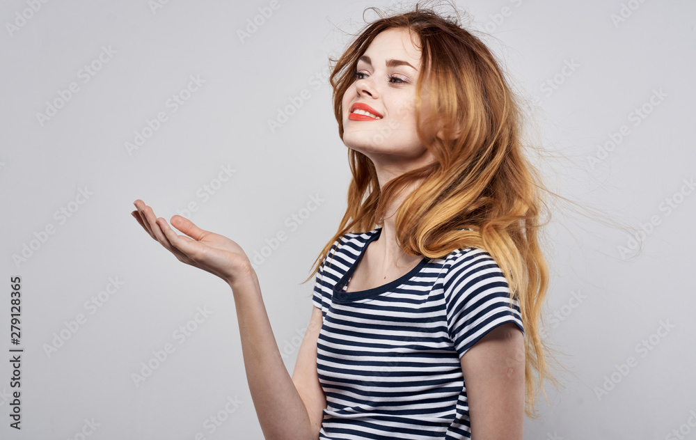 portrait of a young woman pointing at blank copyspace portrait of a young woman pointing at blank copyspace