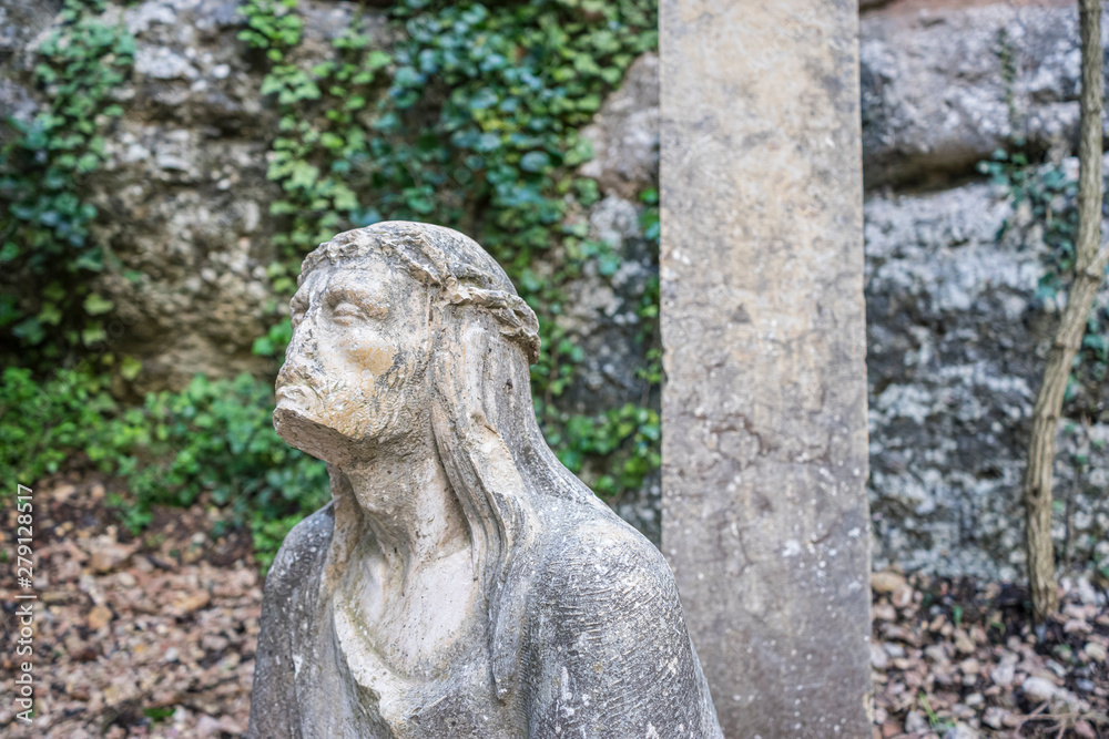 sculpture of jesus on the cross made in stone in the monastery of Montserrat in Barcelona, Spain sculpture of jesus on the cross made in stone in the monastery of Montserrat in Barcelona, Spain