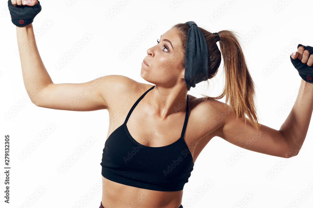young woman with dumbbells