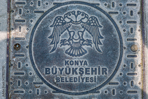 Manhole with inscription in Konya. Close-up.