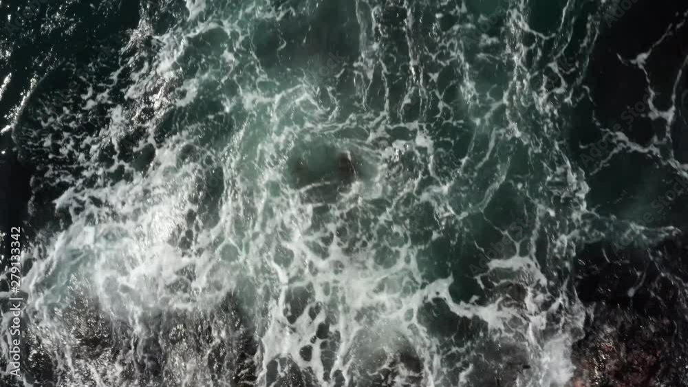 Rushing splashing bubbling ocean water background shot