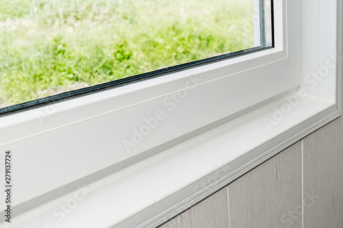 Fototapet Established new white window sill indoors