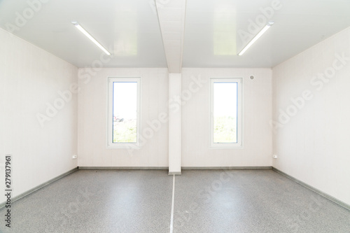 Light white empty office room with bright lighting
