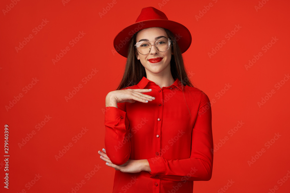 portrait of young woman in red hat portrait of young woman in red hat
