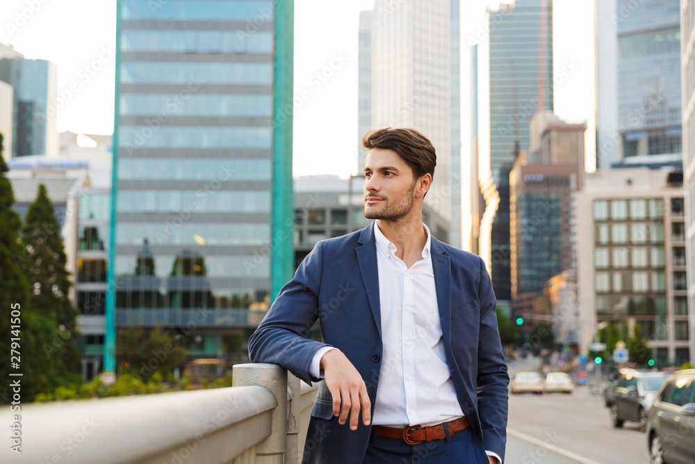 Handsome young businessman smartly dressed Handsome young businessman smartly dressed