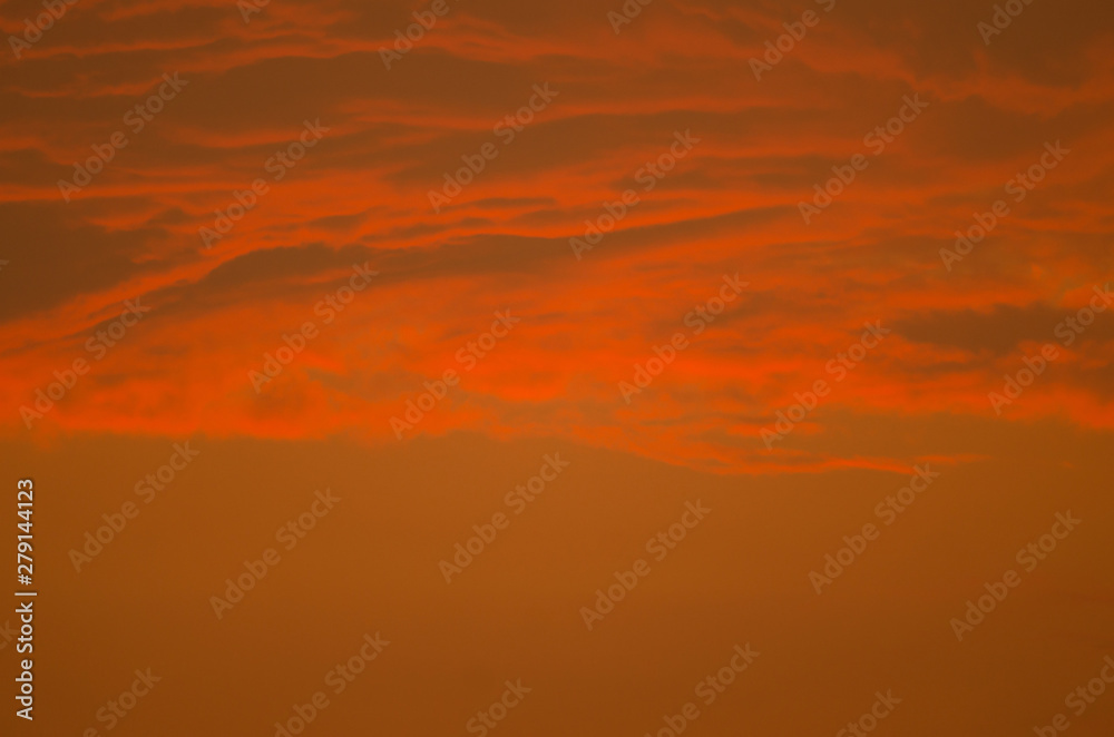 Fototapeta premium Cloudy abstract background. Sunset colors