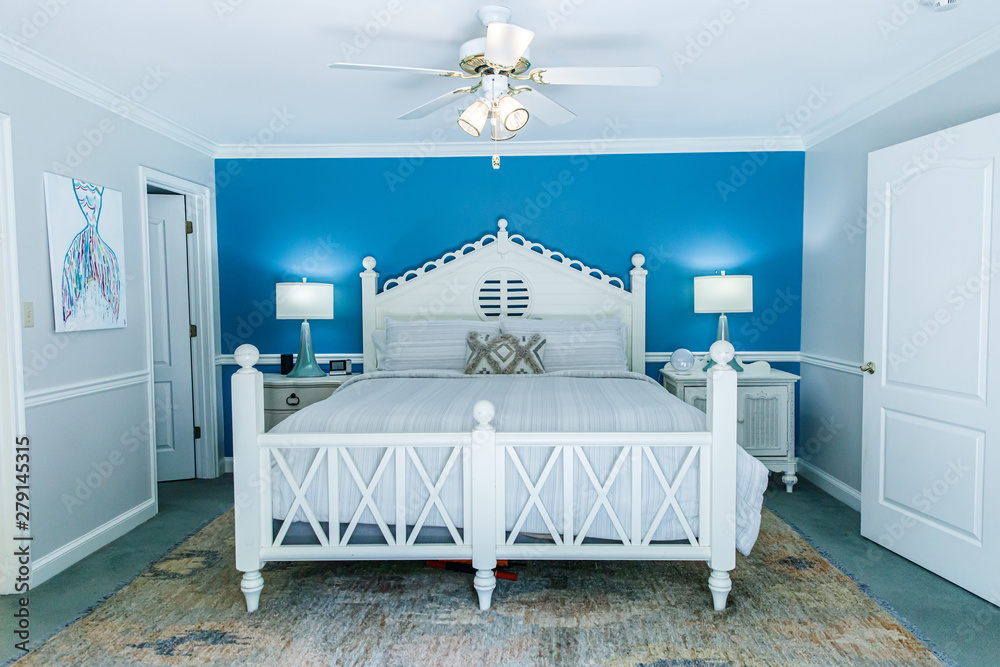 Blue and White Modern Bedroom with King Sized White Wood bed and accent ...