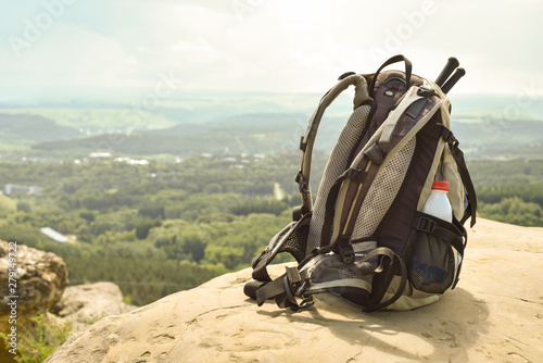 Hipster hiker tourist backpack on background nature in mountain, blurred panoramic landscape, traveler relax holiday concept, view planning wayroad in trip vacation, travel adventure.