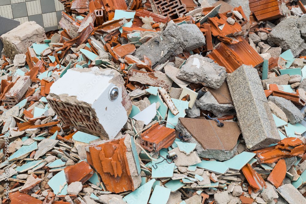 Building waste dump. Bricks, tiles and concrete pieces in heap of ...
