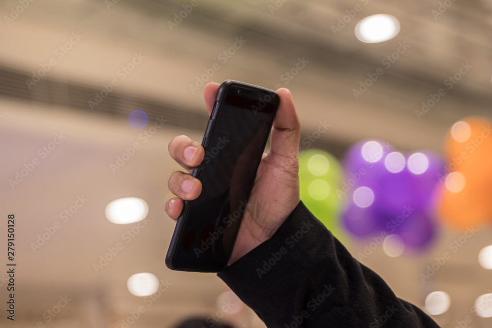 hand holding mobile smart phone hand holding mobile smart phone