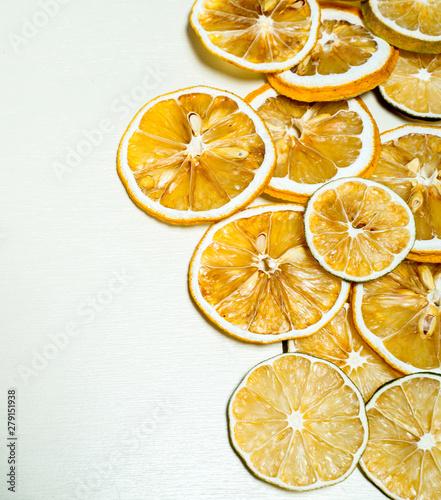 Dried lemnon slice stacked together isolated with white background. Dried lemon slice with dried seeds inside stacked photo