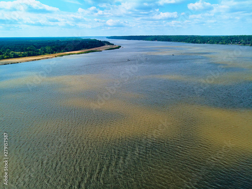 Beautiful panoramic aerial drone view to the place of connecting the Bug and Narew rivers with a warm summer day in July  Poland  Masovian