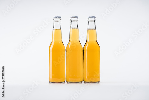 three bottles of beer on white background