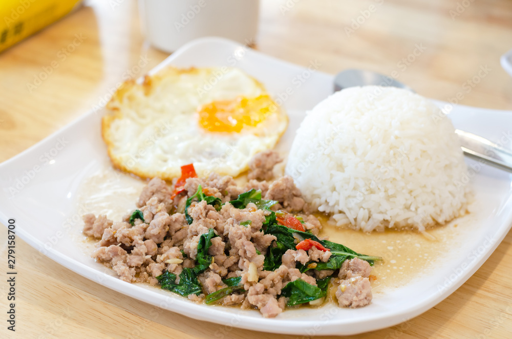 Rice topped with stir-fried pork and basil. Rice topped with stir-fried pork and basil.