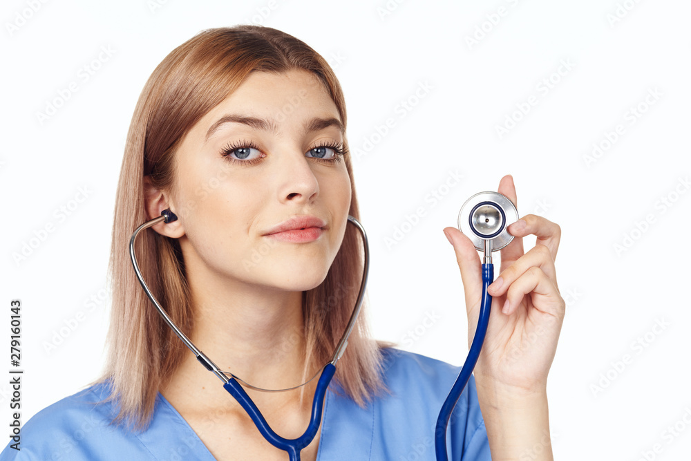 young doctor with stethoscope isolated on white