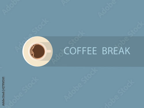 Top view of coffee cup on green background.