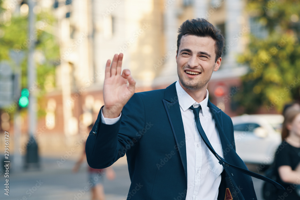 young businessman with thumbs up young businessman with thumbs up