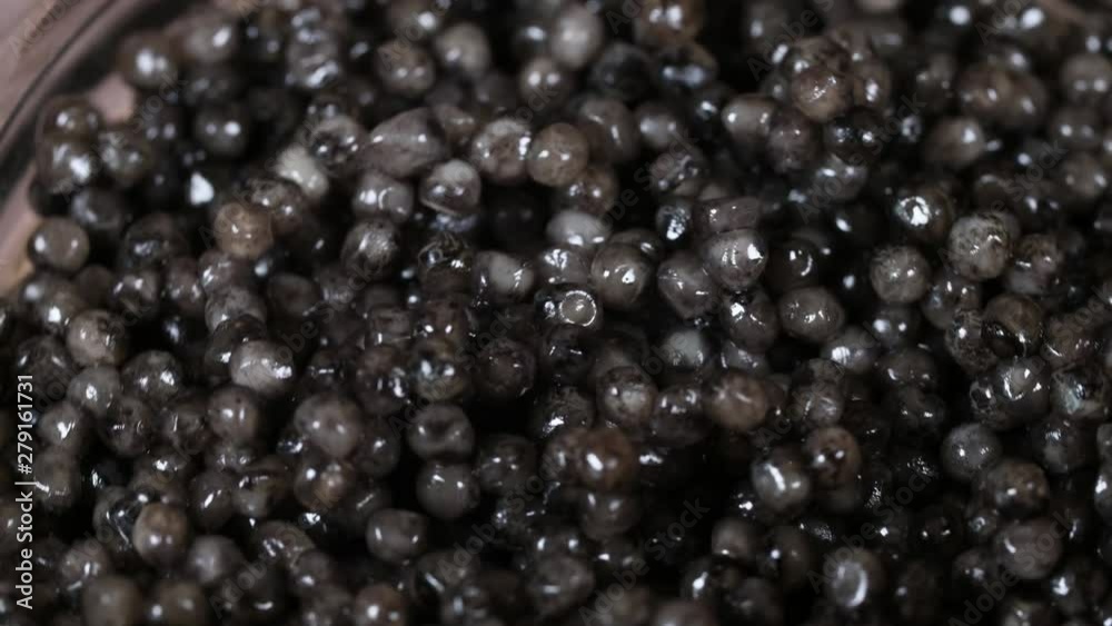 Texture of black caviar, macro and close-up rotation. Texture of black caviar, macro and close-up rotation.