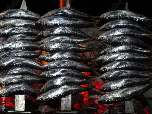 espetos de sardinas a la brasa en playas de malaga photo