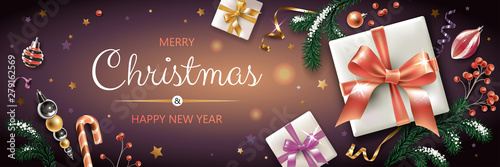 Horizontal banner with colorful Christmas symbols and text. Christmas tree, gift, decoration and other festive elements on black background.