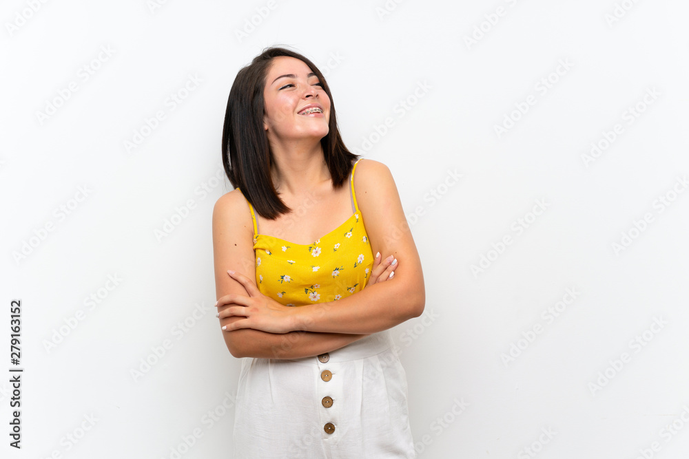 Young Mexican woman over isolated wall happy and smiling Young Mexican woman over isolated wall happy and smiling